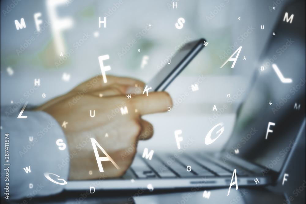 Poster hands using laptop with letters