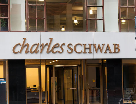 New York, New York, USA - August 31, 2019: Sign on a Charles Schwab brokerage location midtown Manhattan.