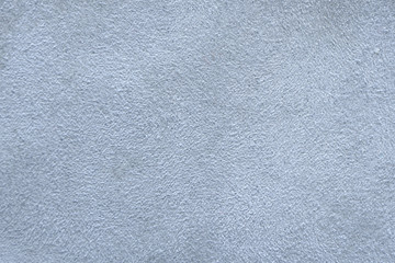 Cool blue background for design and decoration. Empty surface with a fine fleecy structure