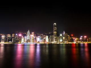 Fototapeta na wymiar Colourful Hong Kong Skyline at Night with Black Sky