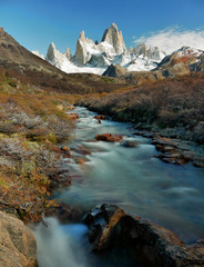 Naklejka na ściany i meble Waterfall in the mountains. Patagonia, Argentina