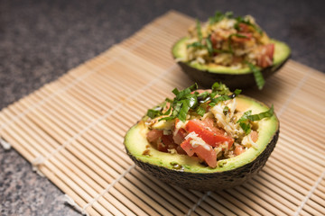 Avocado salad with basil, tomato, cheese and balsamic glaze