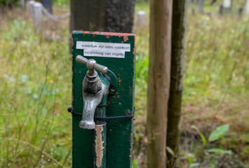 Wasserzapfstelle auf dem Friedhof