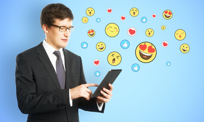 Portrait of handsome businesswoman with smileys