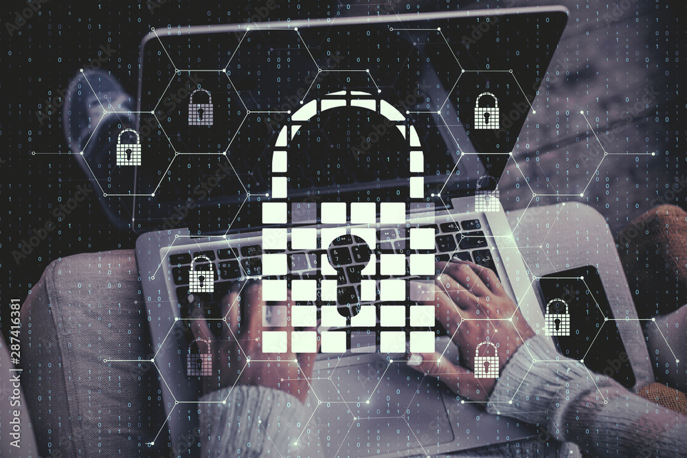 Poster hands using laptop with padlock