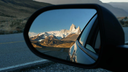 Mountains reflection in the car mirror. Patagonia Argentina