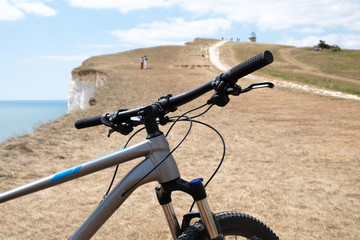 Fototapeta na wymiar Mountain bike on Seven Sisters Cliffs
