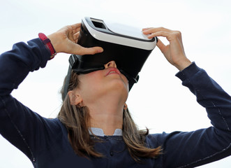 little girl with virtual reality visor