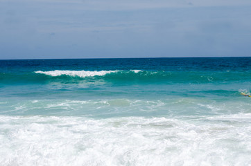 waves with blue sea and sky