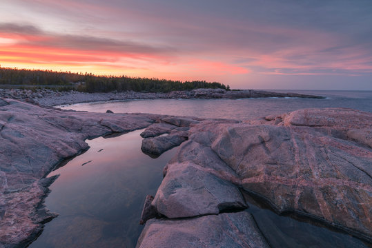 Waves and rocky coastline at sunset, Lackies Head and Green Cove, Cape Breton National Park, Nova Scotia, Canada