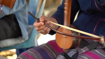 Thai instrument, Thai fiddle, Thailand music, Treble fiddle or soprano sounded string Thai music instrument. 