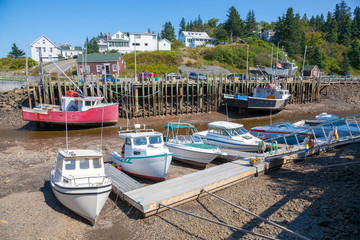 Low tide  fishing boats at Hall's Harbour on the Bay of Fundy, Nova Scotia.