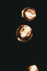 retro style incandescent lamps. Light bulbs in the dark
