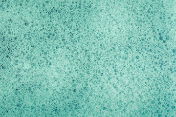 Fototapeta na wymiar Soap bubbles background- suds liquid
