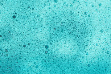 Soap bubbles background- suds liquid