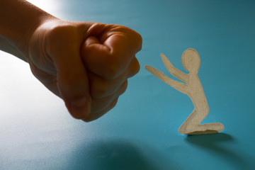 Kneeling paper person