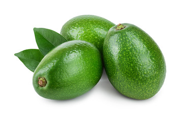 whole avocado with leaves isolated on white background close-up