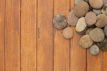 round zen stones on wooden background