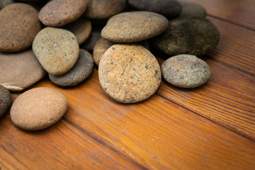 stones on wooden background