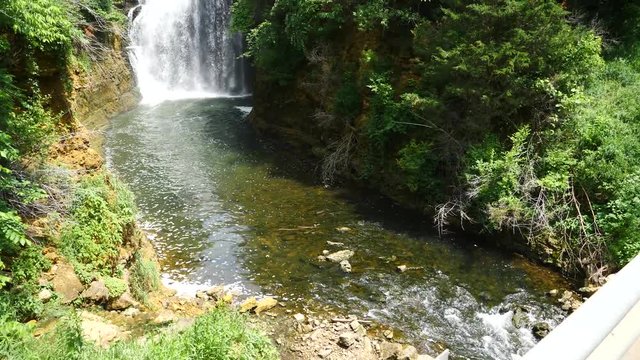 waterfall and stream of water panning shot