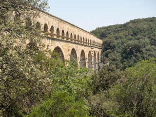 Obraz premium France, July 2019: Pont du Gard is an old Roman aqueduct near Nimes in Southern France
