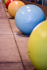 street art colored balls along the sidewalk