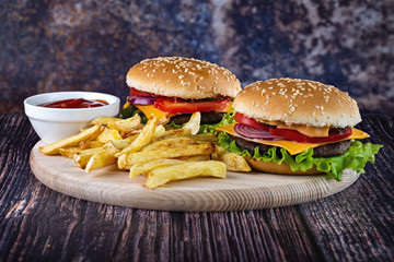 Delicious burgers with fries
