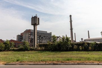 Fototapeta na wymiar Industrial landscape, Empty buildings of an inactive plant along
