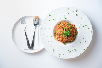 Spaghetti bolognese with tomato sauce on plate.