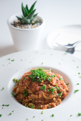 Spaghetti bolognese with tomato sauce on plate.