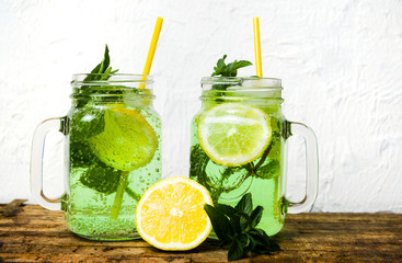Lemonade with marijuana in a glass isolated