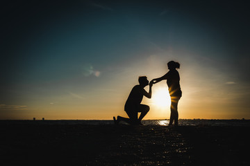 silhouette of a couple at sunset