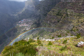 Rainbow over Valley of the Nuns, Curral das Freiras on Madeira Island, Portugal