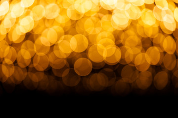 Blur background of gold color bokeh light