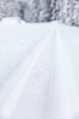 Long ski tracks in a deep snow