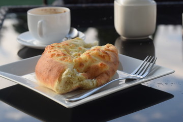 breakfast with croissants and coffee