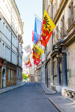 Colorful flags on building walls in Geneva, Switzerland