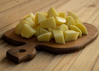 Sliced potatoes. Cooking process concept. Natural and fresh potatoes