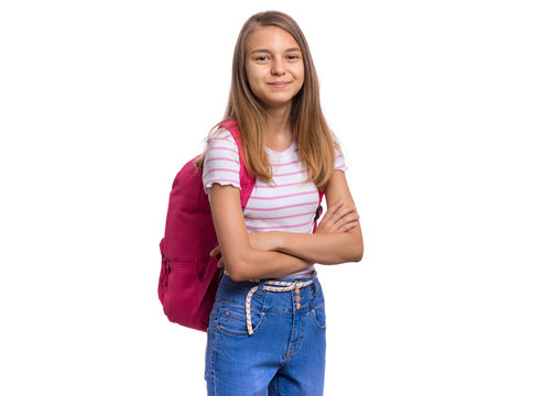 Beautiful Student Teen Girl With Backpack Looking At Camera. Portrait Of Cute Smiling Confident Schoolgirl With Folded Arms, Isolated On White Background. Happy Child With Bag Back To School.