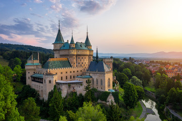 Aerial view of Bojnice medieval castle, UNESCO heritage in Slovakia. Romantic castle with Gothic and Renaissance elements built in 12th century. - obrazy, fototapety, plakaty