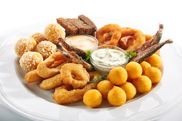 Beer Snacks or Beer Plate with Fried Seafood, Onion, Cheese and Sauces