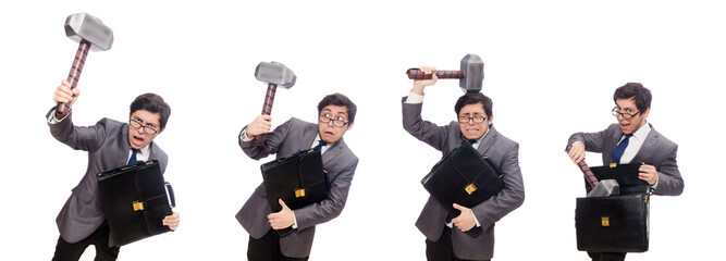 Business man holding hammer isolated on white