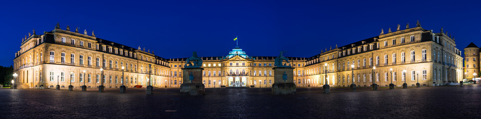 Germany, XXL panorama of downtown stuttgart city new castle building by night with blue sky in...