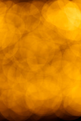 Blur background of gold color bokeh light