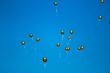 colorful golden balloons in the sky in school first day