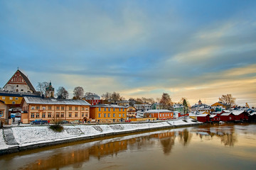 Old historic Porvoo, Finland with wooden houses and medieval stone and brick Porvoo Cathedral at blue hour sunrise
