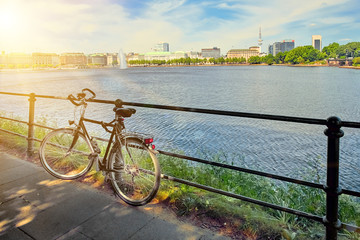 Nice bicycle on sunny summer day at the Alster lake in Hamburg, Germany - 287442183