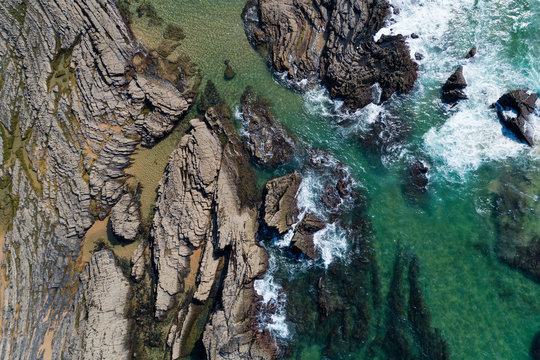 Aerial view of the rock formations at the Carreagem Beach in Aljezur, Algarve;