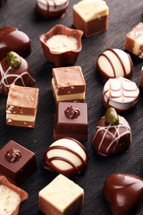 a lot of variety chocolate pralines, belgian confectionery gourmet chocolate.