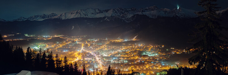 Aerial panorama of Zakopane and Tatry mountains at night